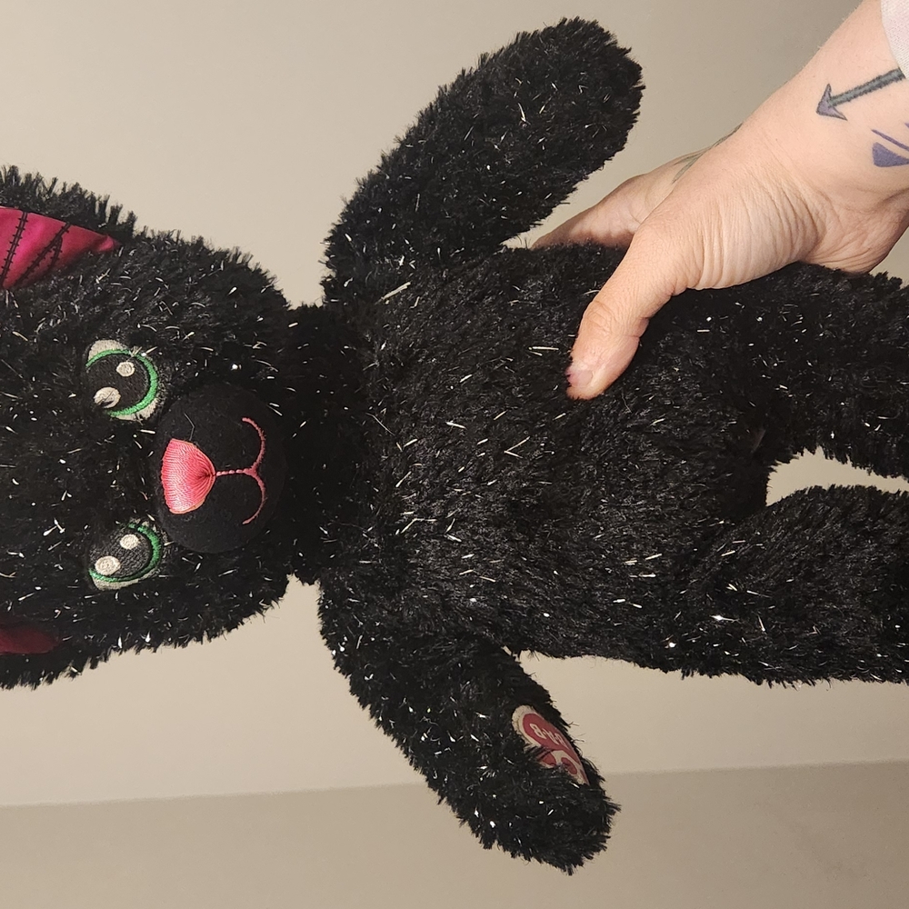 Black Plush Cat Toy with Pink Accents
